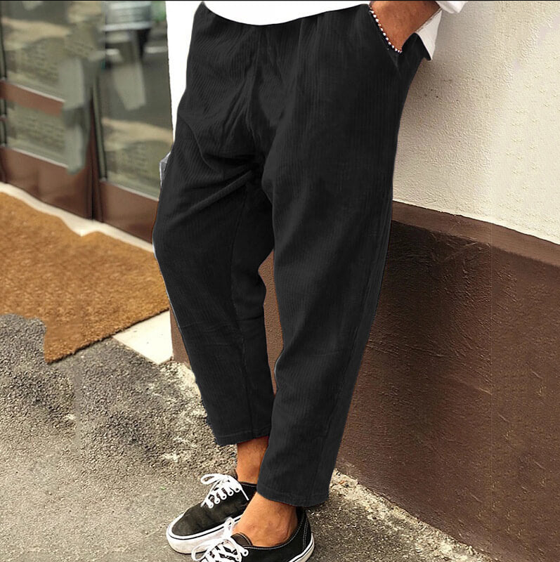 Herren-Hybridhose mit elastischem Bund und Reißverschlusstaschen aus Funktionsmaterial
