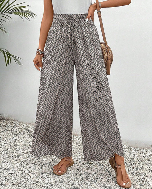 Damenhose mit geometrischem Druck und elastischem Bund aus Materialmix